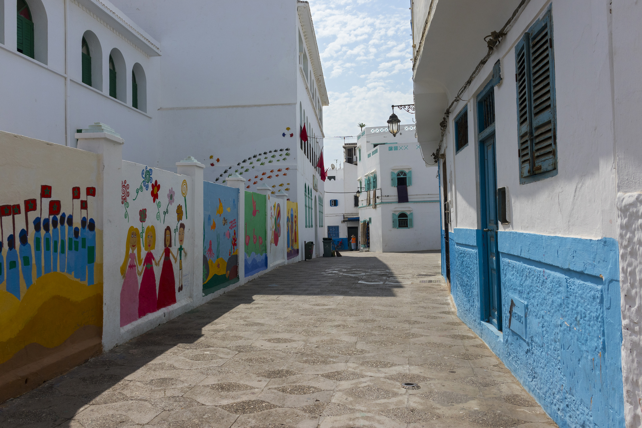 Mural art on the wall of the school building in the medina of Asilah